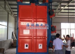 Q3730吊钩式抛丸机发往上海用于健身器材抛丸处理